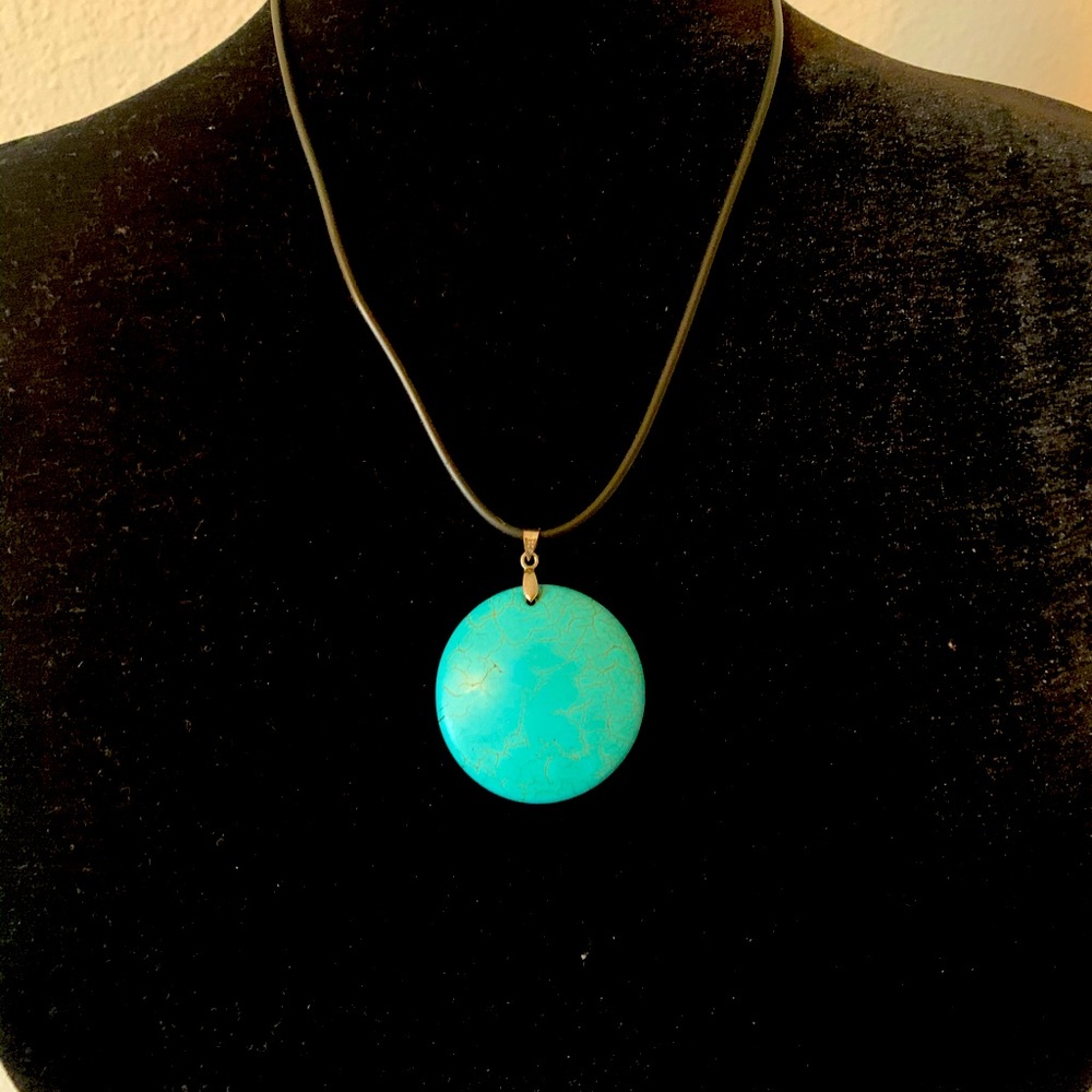 Teal pendant on black cord necklace
